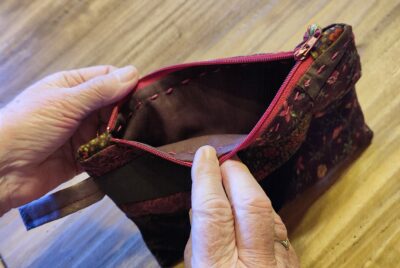 Random patchwork zippered pouch with tassel - Image 8