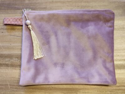 Soft velvet zippered pouch with tassel