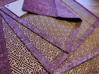 Set of four textile placemats