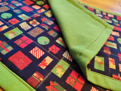 Set of two quilted placemats for kids in Christmas theme