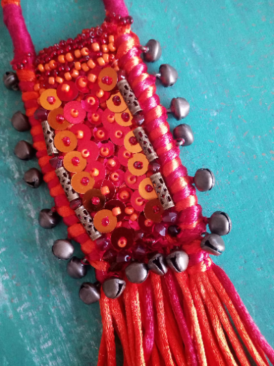 Ethnic style necklace with kumihimo braiding